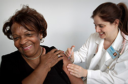 woman getting a vaccination